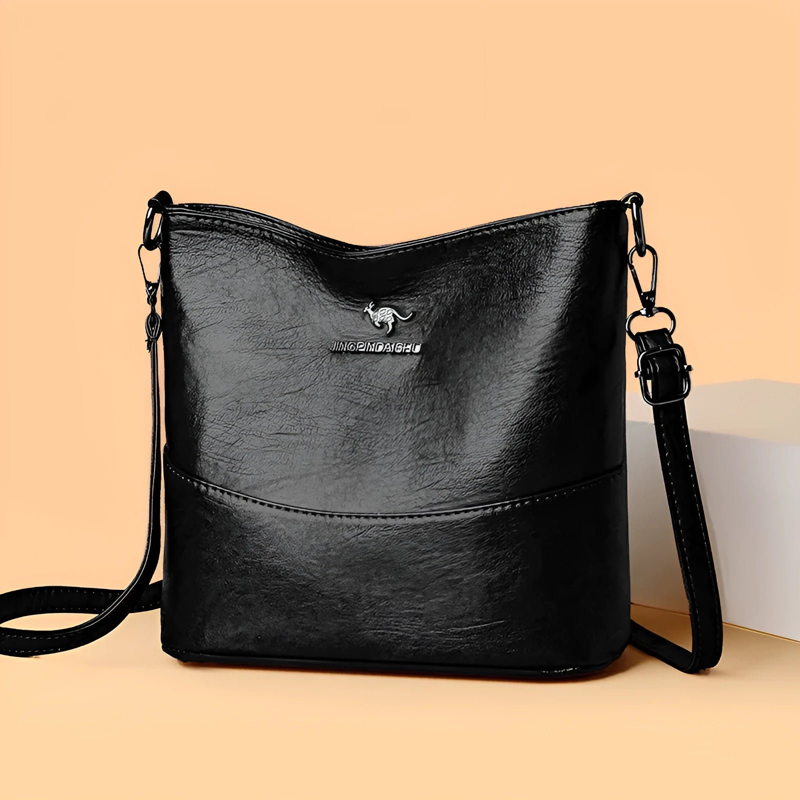 Women's soft leather large capacity shoulder bag in bucket shape with minimalist luxury styling