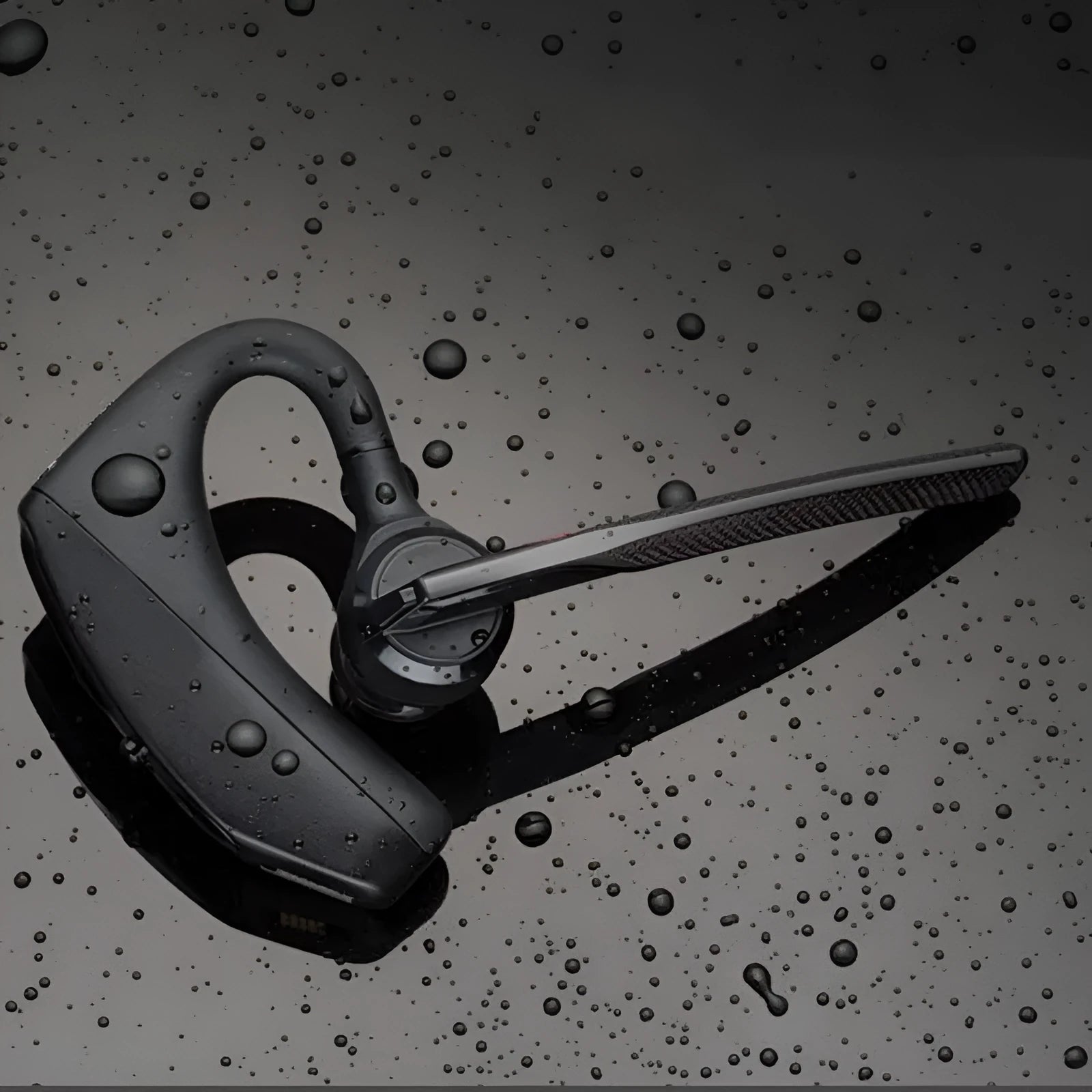 Black stereo Bluetooth sports headphones with battery display and USB charging cable