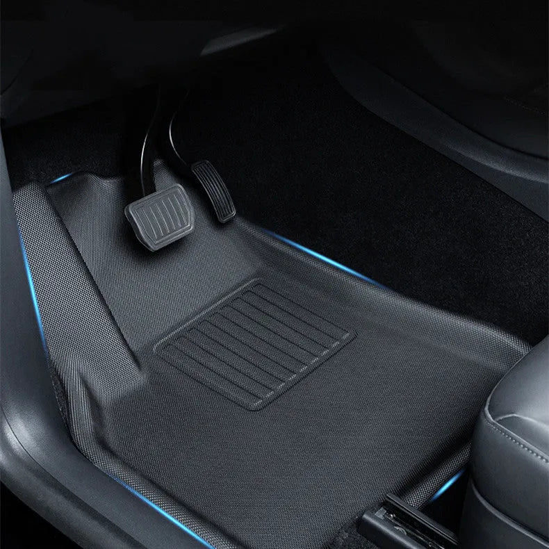 TPR floor mat set for Tesla Model Y showing footrest, tailbox, and front storage mats