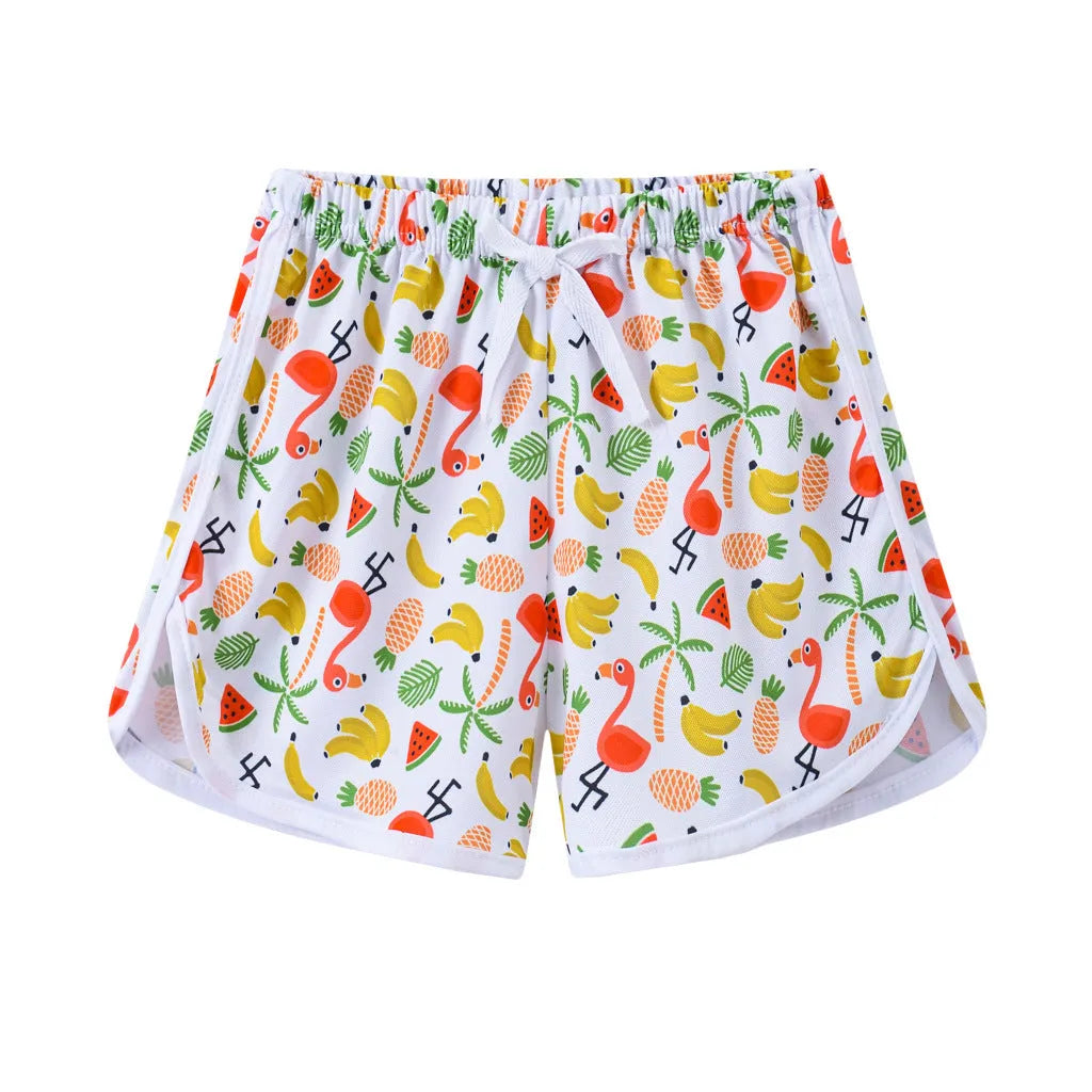 Children's casual polyester shorts in assorted colours and prints like pineapple, kitten, and stripes for beach wear.