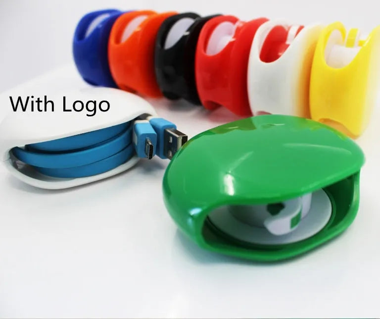Automatic earphone cable retractor winder in a compact plastic storage box.