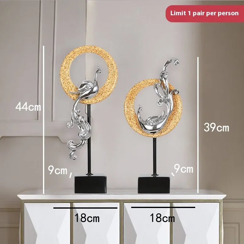 European style plastic resin phoenix ornament in rose gold colour on a table.