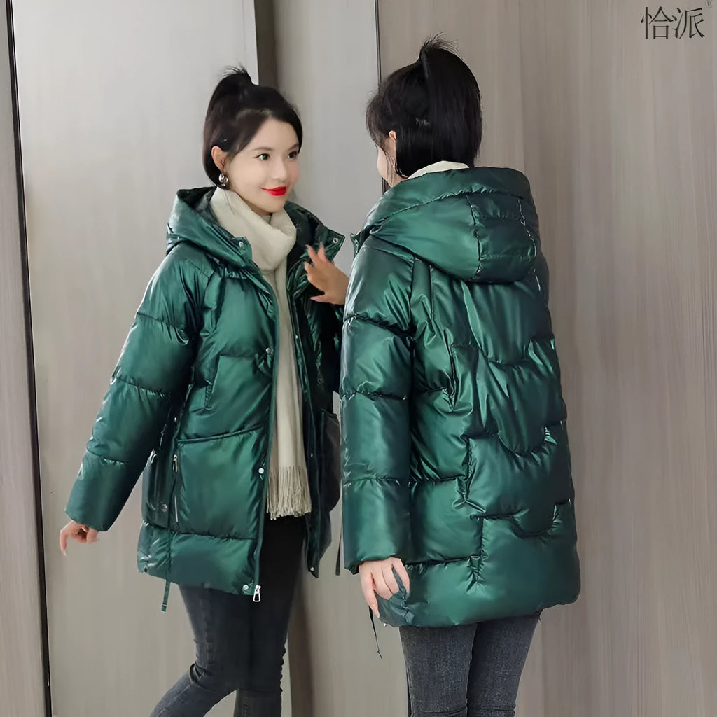 Women's loose fit hooded winter jacket in polyester blend available in four colours with Asian sizing.