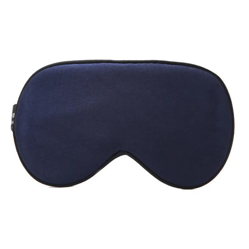 Double-sided mulberry silk eye mask in champagne colour with embroidered print.