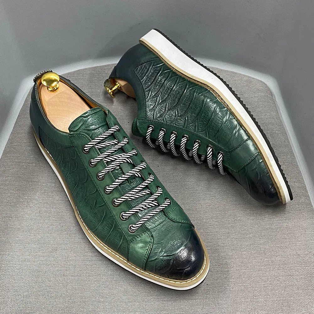 Men's low-top leather sneakers with an embossed pattern on the upper, shown in a choice of colours.