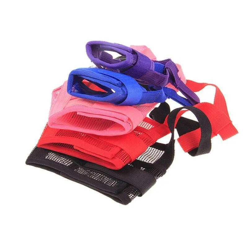 A plastic adjustable dog muzzle shown in multiple colours including black, blue, and pink.