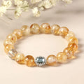 Geometric citrine crystal bracelet with 10mm beads in polished finish