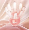 Small pink octopus-shaped periocular massage comb made from natural resin with storage bag