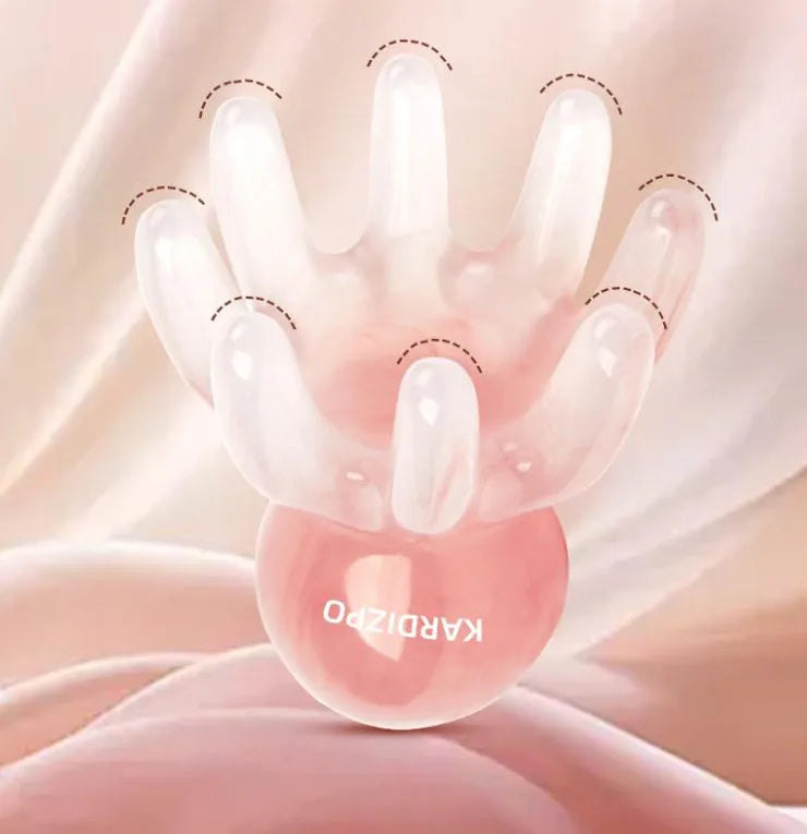 Small pink octopus-shaped periocular massage comb made from natural resin with storage bag