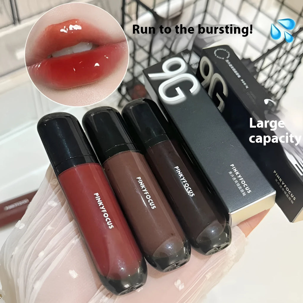 Black Citrus Mirror Lip Lacquer tube showcasing six colour shades: Black Tomato, Orange Brown, Bean Paste, Rose, And Red, Sweet Potato.