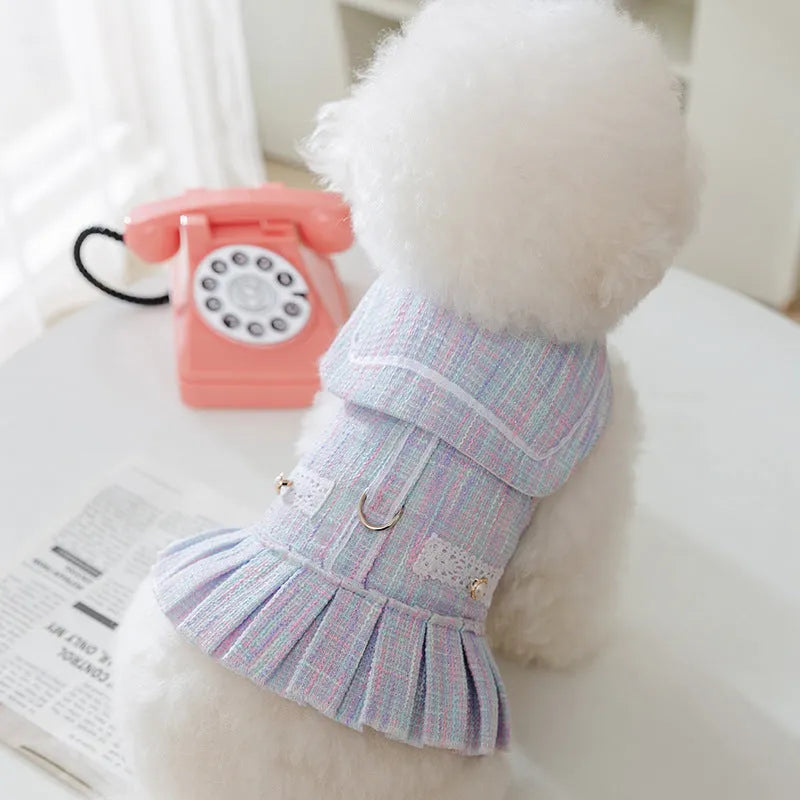 Purple and pink lightweight polyester clothing for a small dog or cat on a hanger.