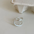 Three-dimensional interlaced geometric open ring in matte metal with gold plating
