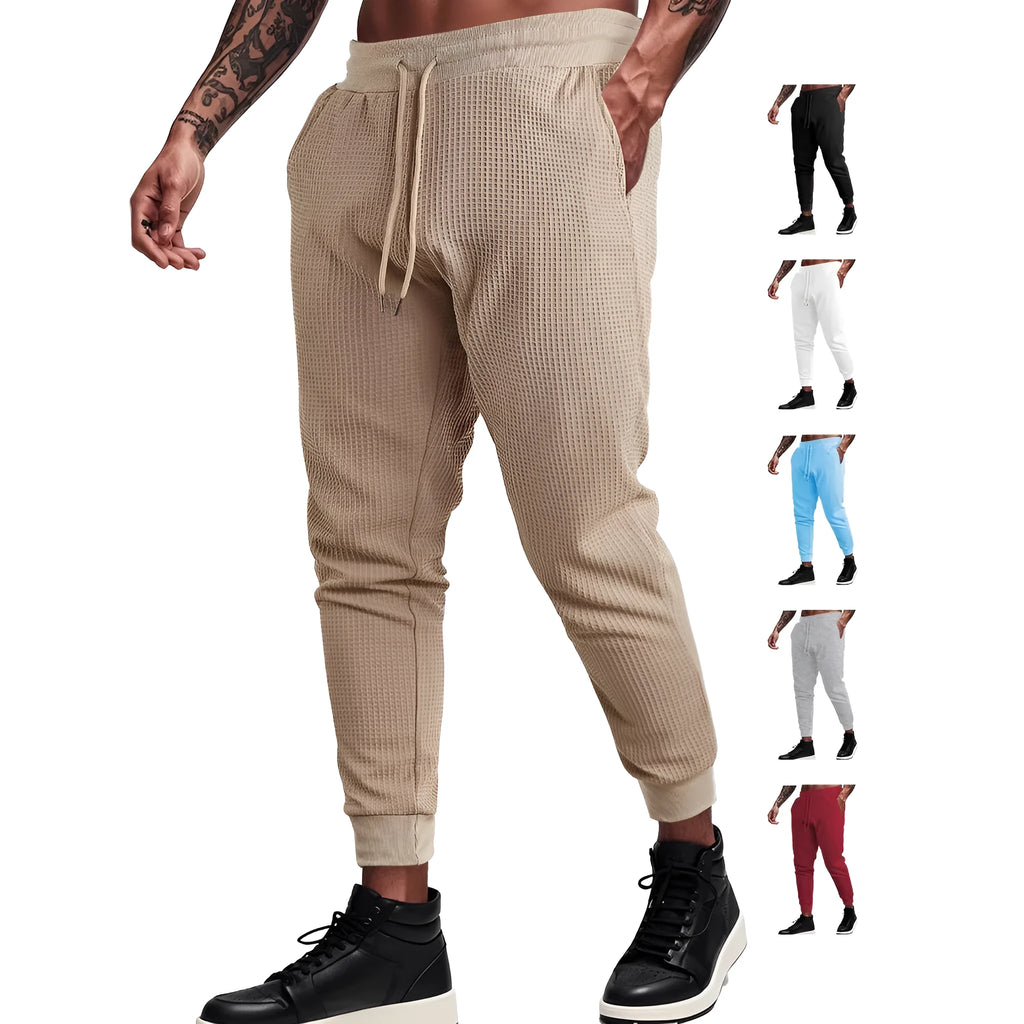 Men's casual loose solid colour drawstring pants in waffle knit polyester, front view