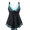 Plus size two-piece bikini swimsuit in blue on a mannequin, showing briefs style and sleeveless top.