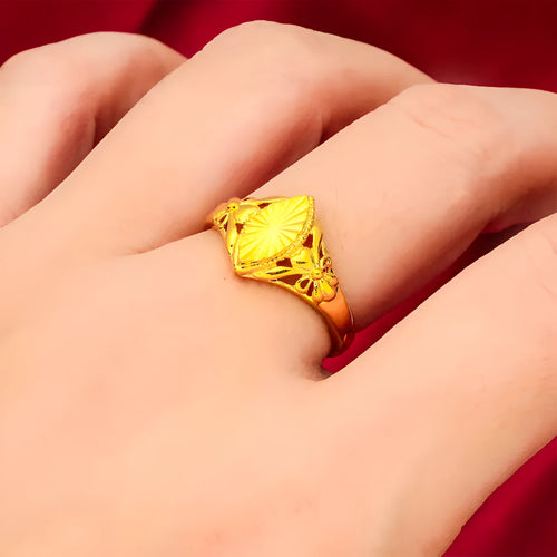 Gold open geometry ring with diamond flower pattern and textured botanical detailing