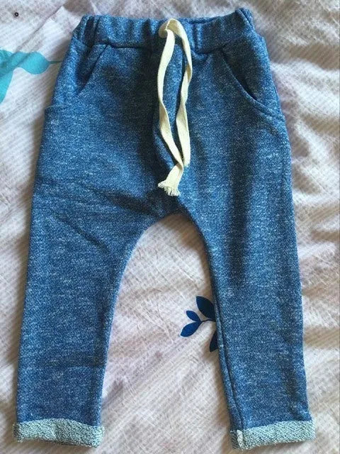 Cotton children's pants for baby girls and boys in multiple colours including blue, pink, and grey, sizes 2T to 6