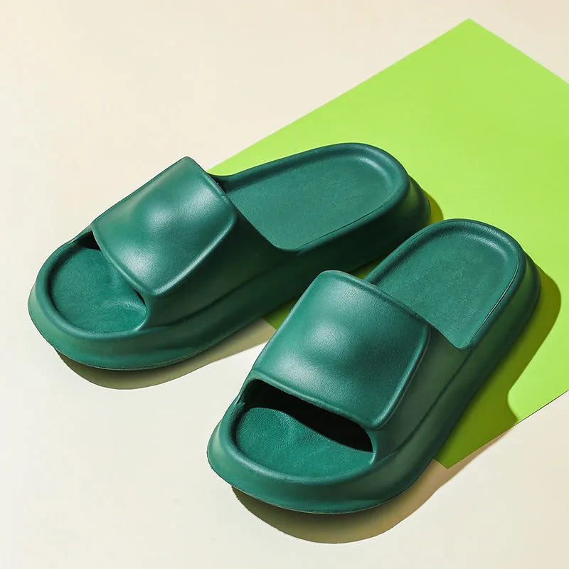 A pair of thick-soled EVA foam flip-flop slippers in a choice of seven colours on a plain background.