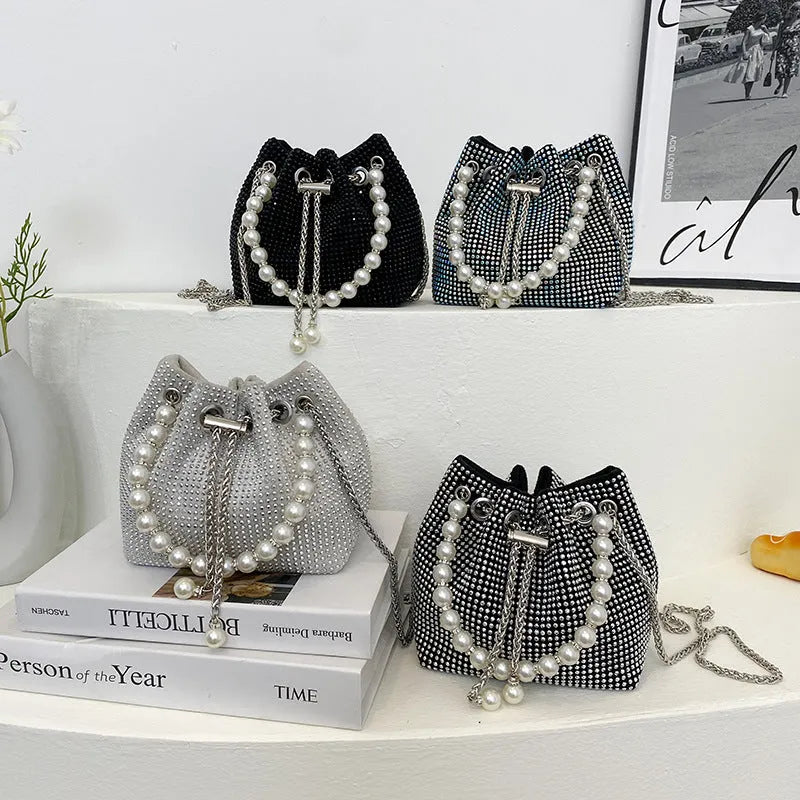 Western-style diamond shoulder bag with chain crossbody strap in bucket shape