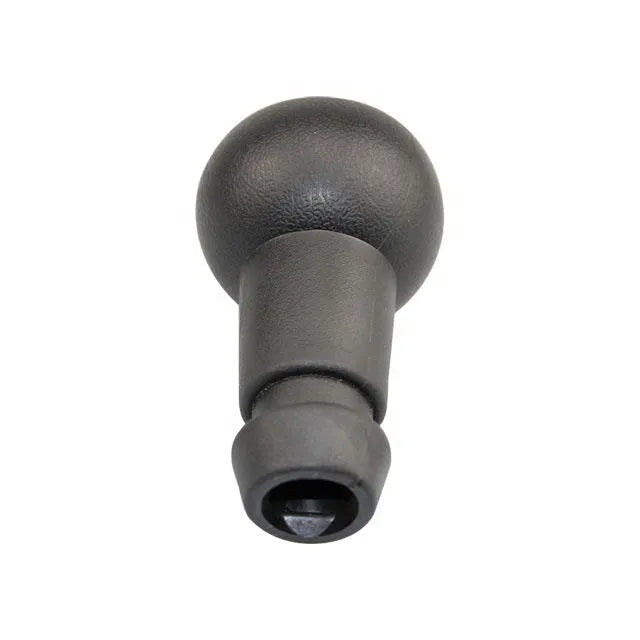 Black GM universal manual transmission gear head on a shift lever