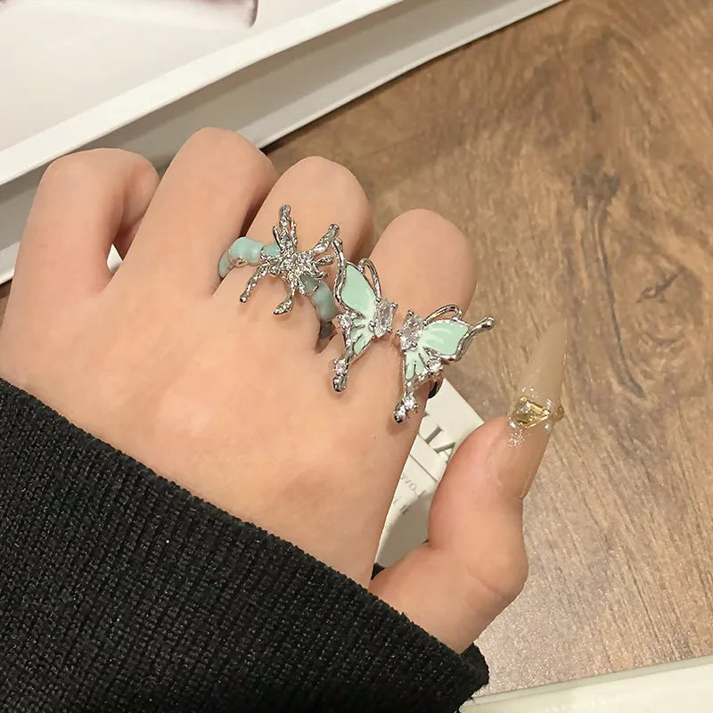 Adjustable open loop copper butterfly ring for women in a creative Chinese design.