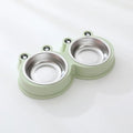 Stainless steel pet double bowl with frog design showing separate food and water compartments