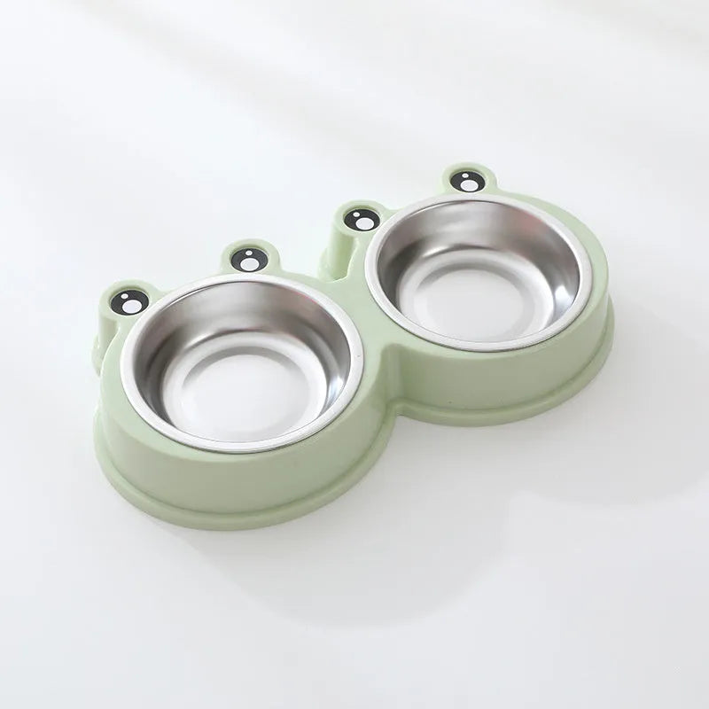 Stainless steel pet double bowl with frog design showing separate food and water compartments