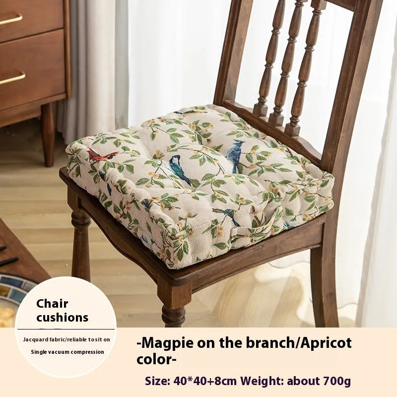 American style dining chair cushion in floral apricot pattern with bird motifs measuring 40x40x8cm
