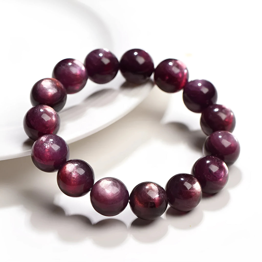 Purple lepidolite crystal round bead bracelet showing polished surface and geometric bead arrangement