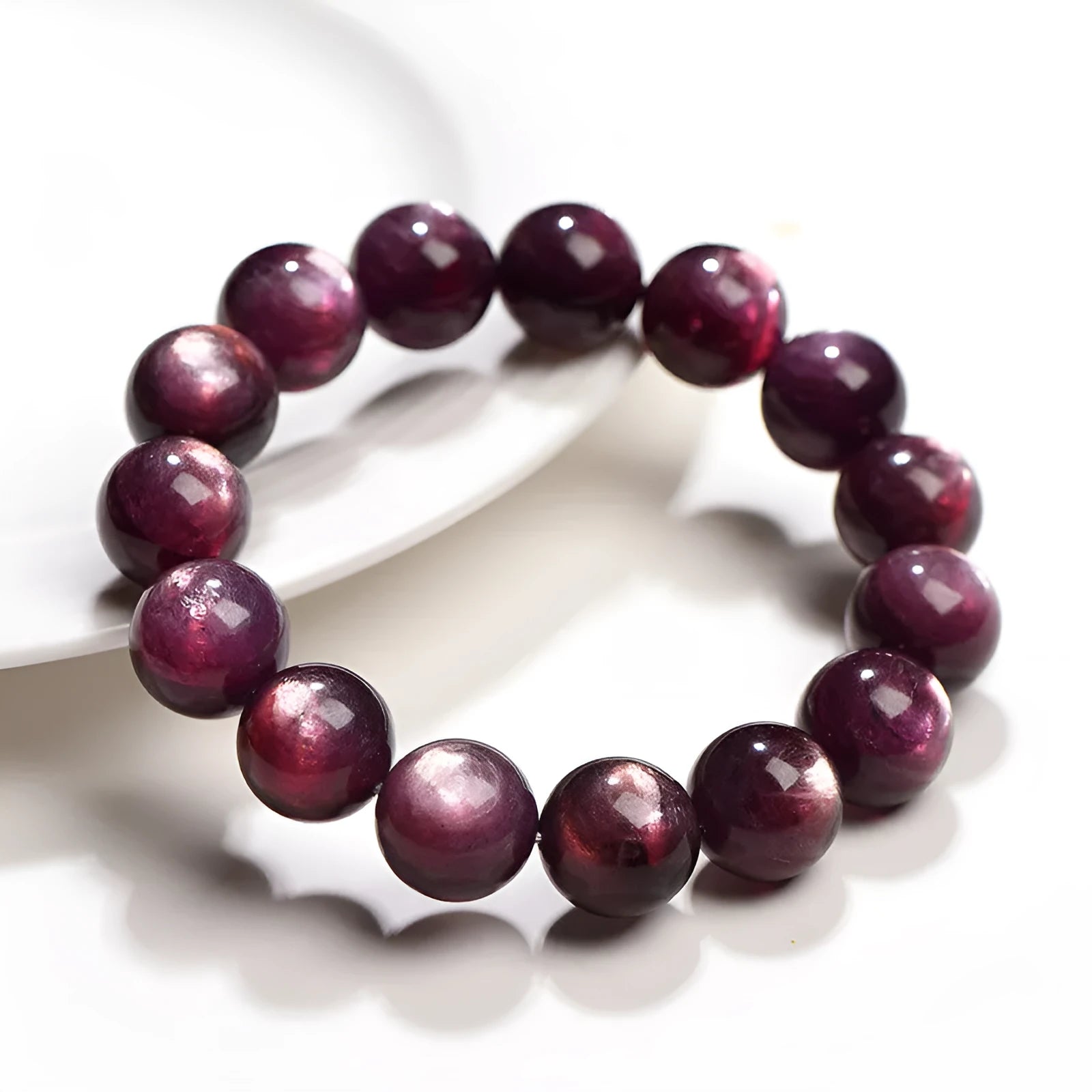 Purple lepidolite crystal round bead bracelet showing polished surface and geometric bead arrangement