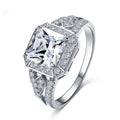 Women's geometric zircon ring with platinum finish on a copper band, showing hollow construction and quadrilateral design.