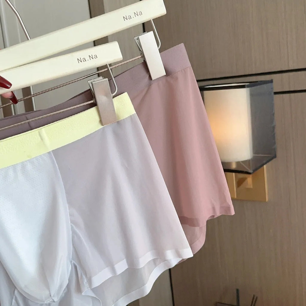Seamless ultra-thin men's boxers in Ice Silk fabric with a honeycomb crotch, shown in a neutral colour.