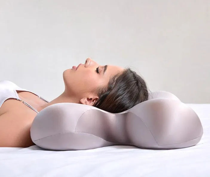 Purple memory foam side sleeping pillow 58x40cm on a bed