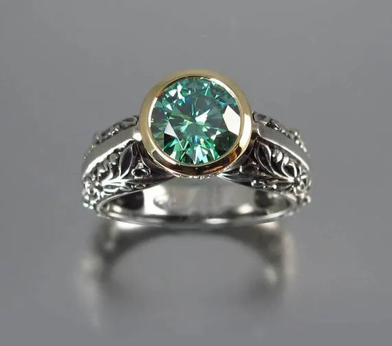 Flower-shaped gold-plated vintage gemstone ring with green silver colour separation design