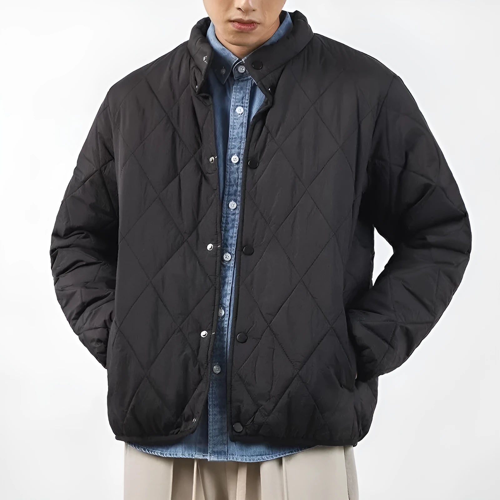Men's black diamond lattice patterned winter jacket with lengthened cut and padded construction