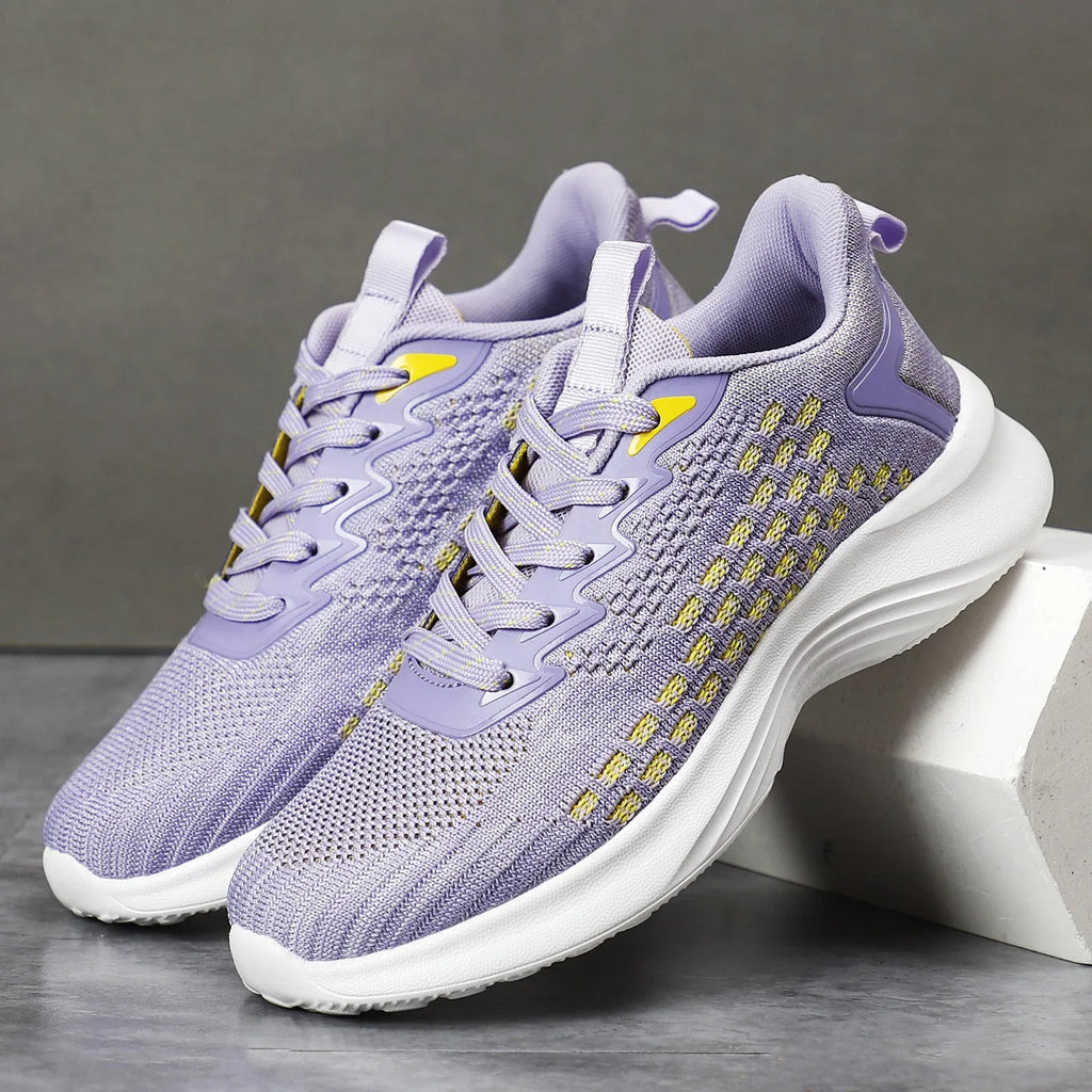 Women's lavender purple flyknit running shoes with mesh lining and striped pattern