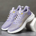 Women's lavender purple flyknit running shoes with mesh lining and striped pattern