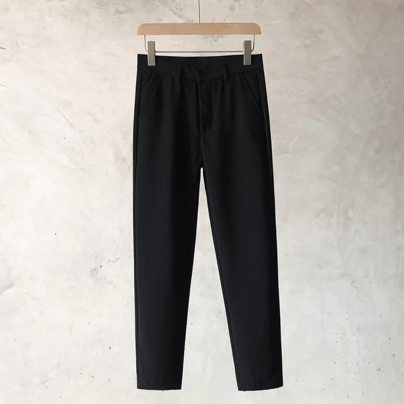 Boys slim straight wool trousers in tapered fit with straight leg opening available in multiple colours