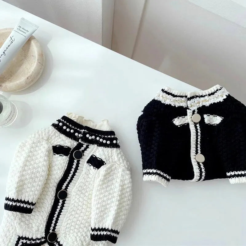 Korean-style dog sweater with pearl collar in black and white colours showing princess cut