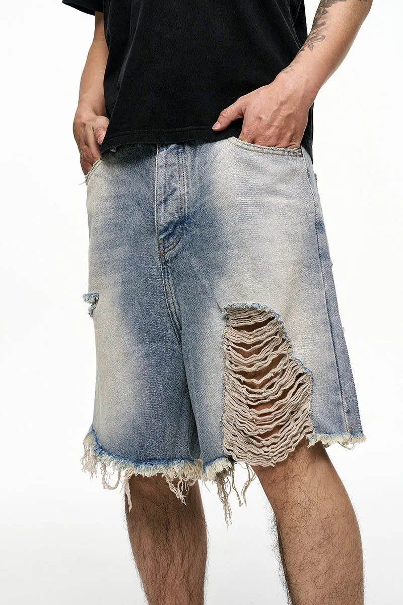 Men's light blue retro washed baggy denim shorts with wide leg and zipper fly