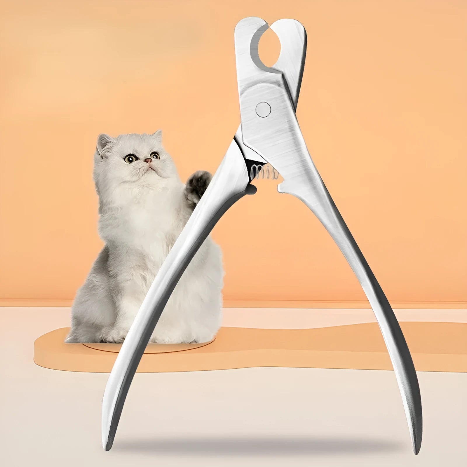 Silver professional pet nail clipper with stainless steel blades and safety guard for dog and cat grooming.