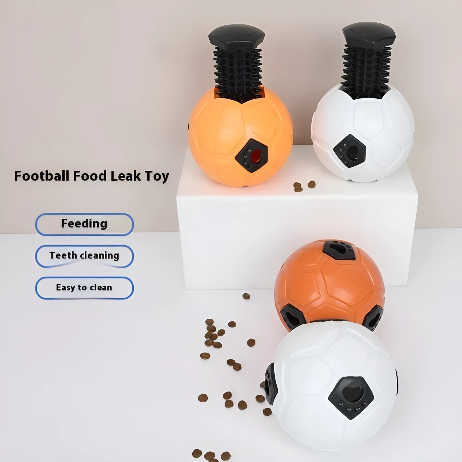 Orange and white TPR dog chew toy ball for teeth grinding and interactive play.