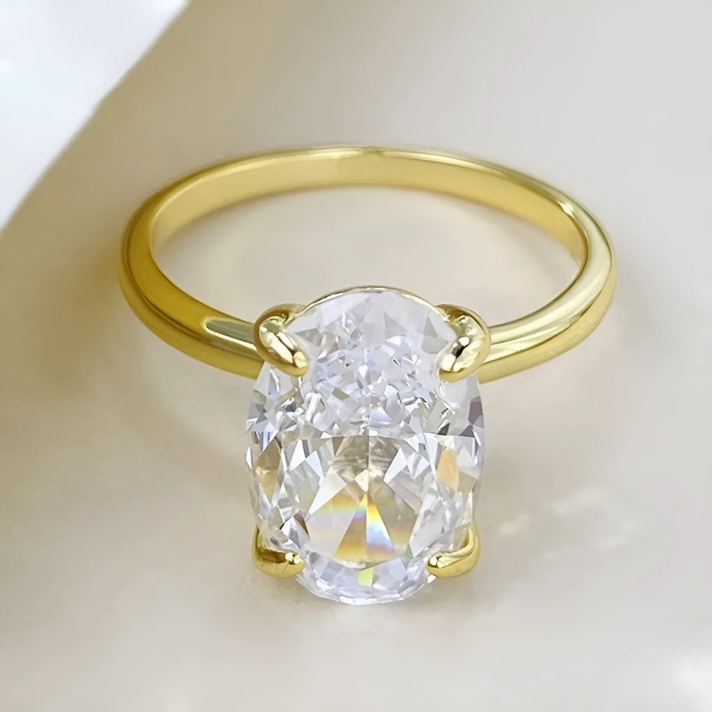 Oval women's ring with four-claw setting in 9 silver, gold and silver colour options