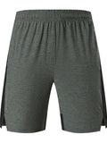 Men's forest green five-point spandex casual shorts laid flat, showing mid waist and short leg design.