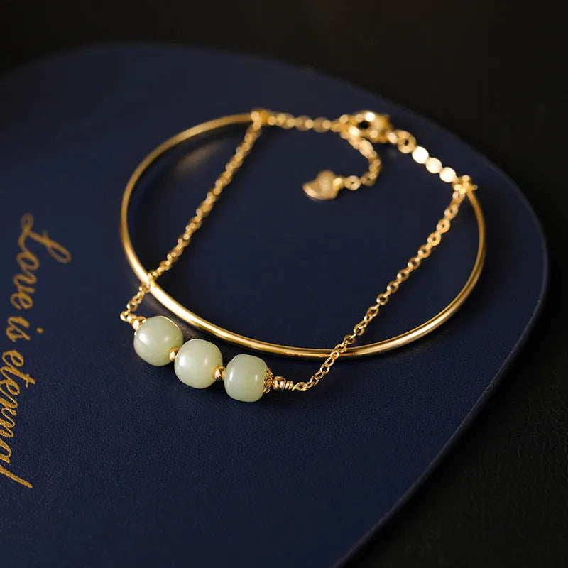 Women's jade lucky beads bracelet with gold inlay decoration in single, double and three beads versions