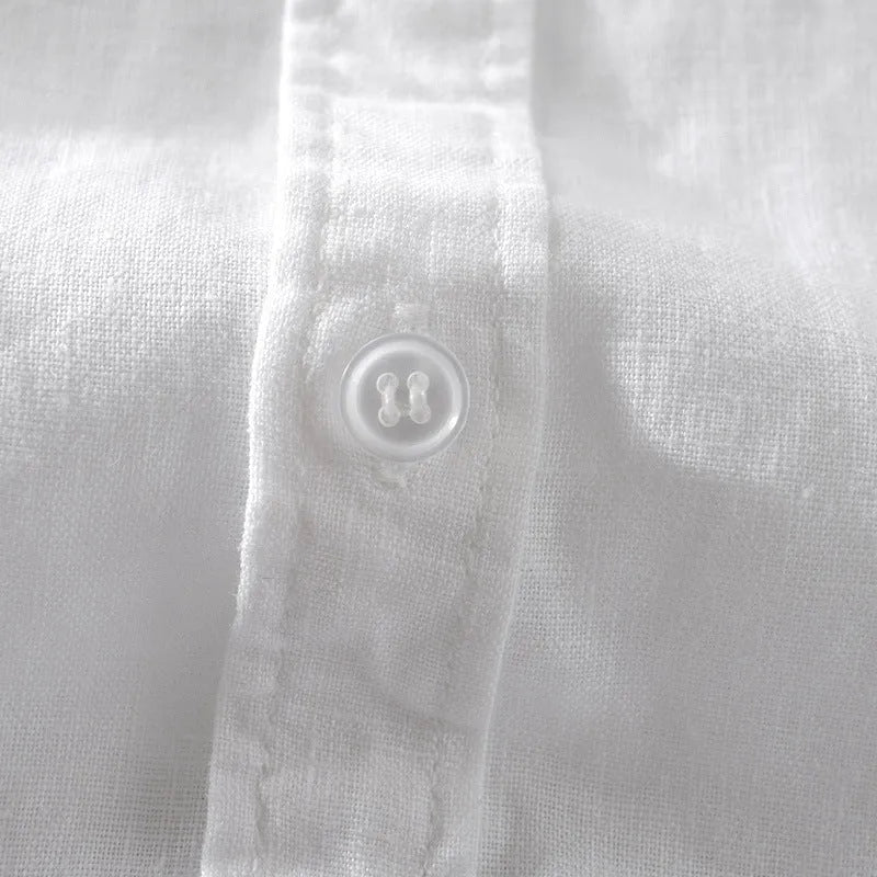 Man wearing a loose fit apricot coloured short sleeve linen blend casual shirt.