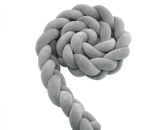 Baby crib bumper braid knot pillow cushion in spandex velvet, shown in a light grey colour
