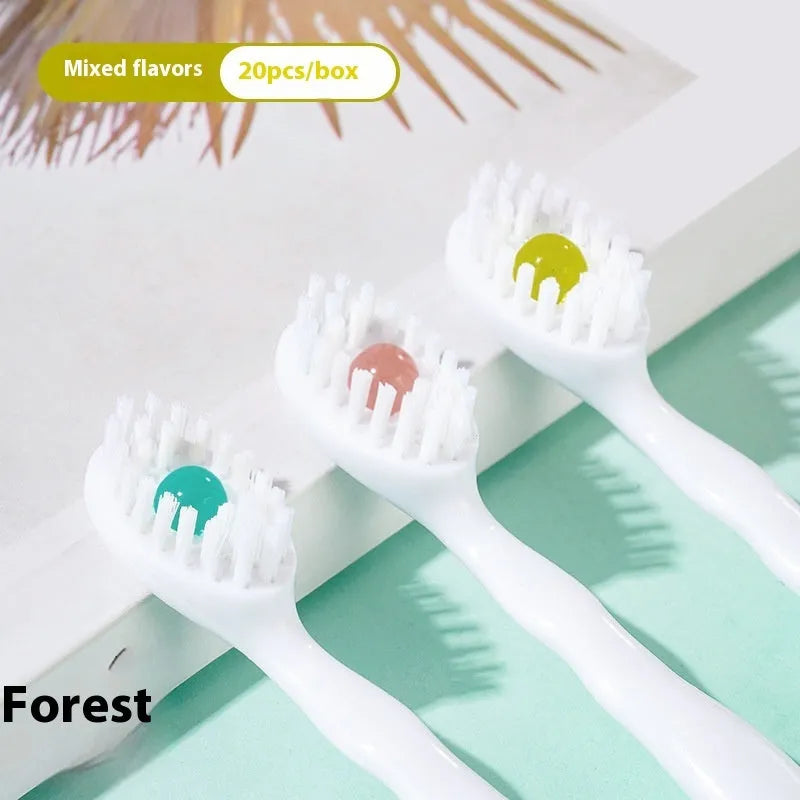 Box of 20 disposable bead toothbrushes for travel, shown with mint and peach flavour options.