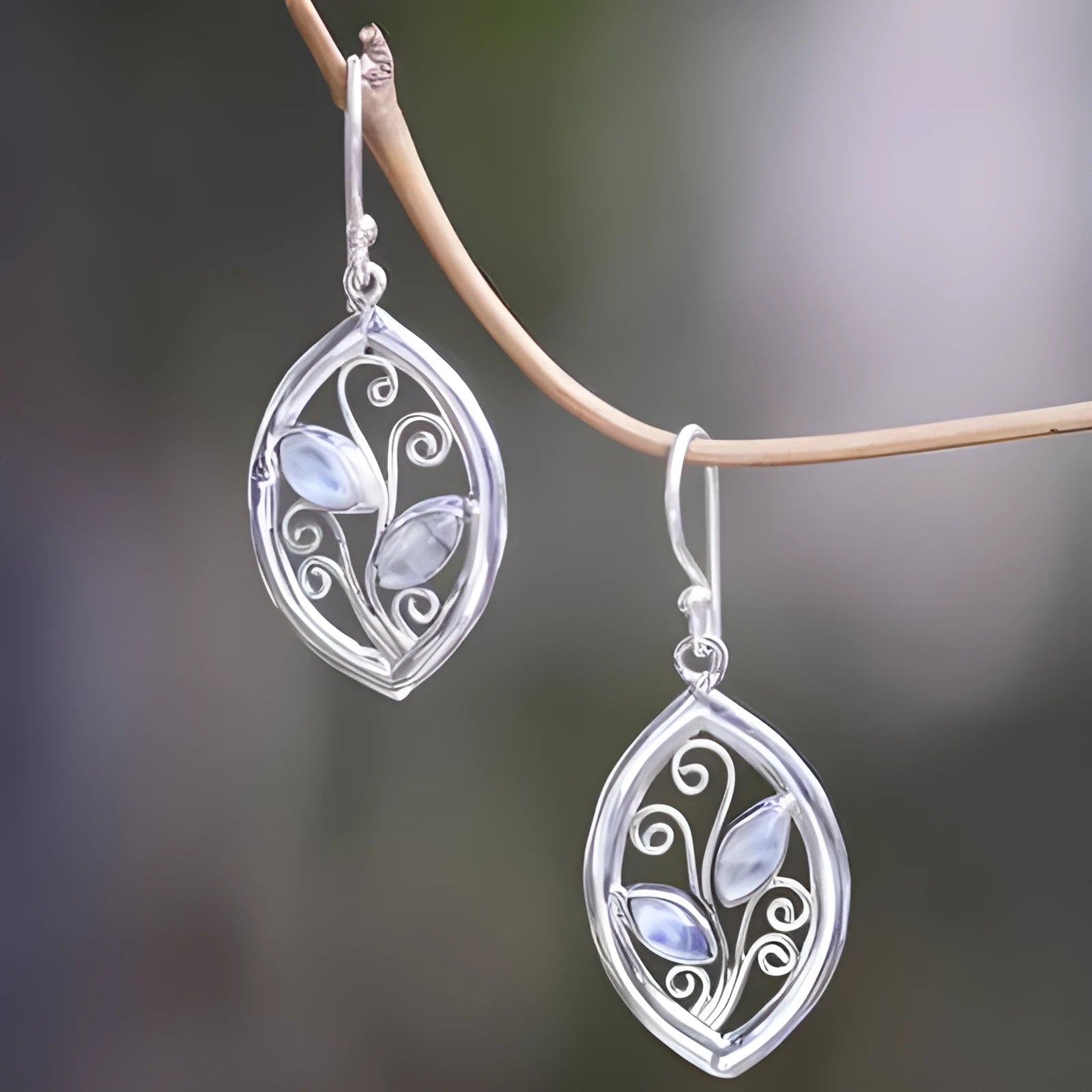 Women's silver leaves embedded colourful moonstone earrings with European American creative design