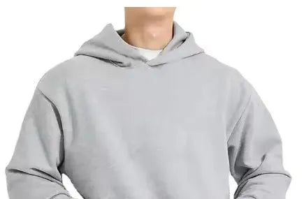Men's grey fleece-lined pullover hoodie with wool lining shown in casual wear