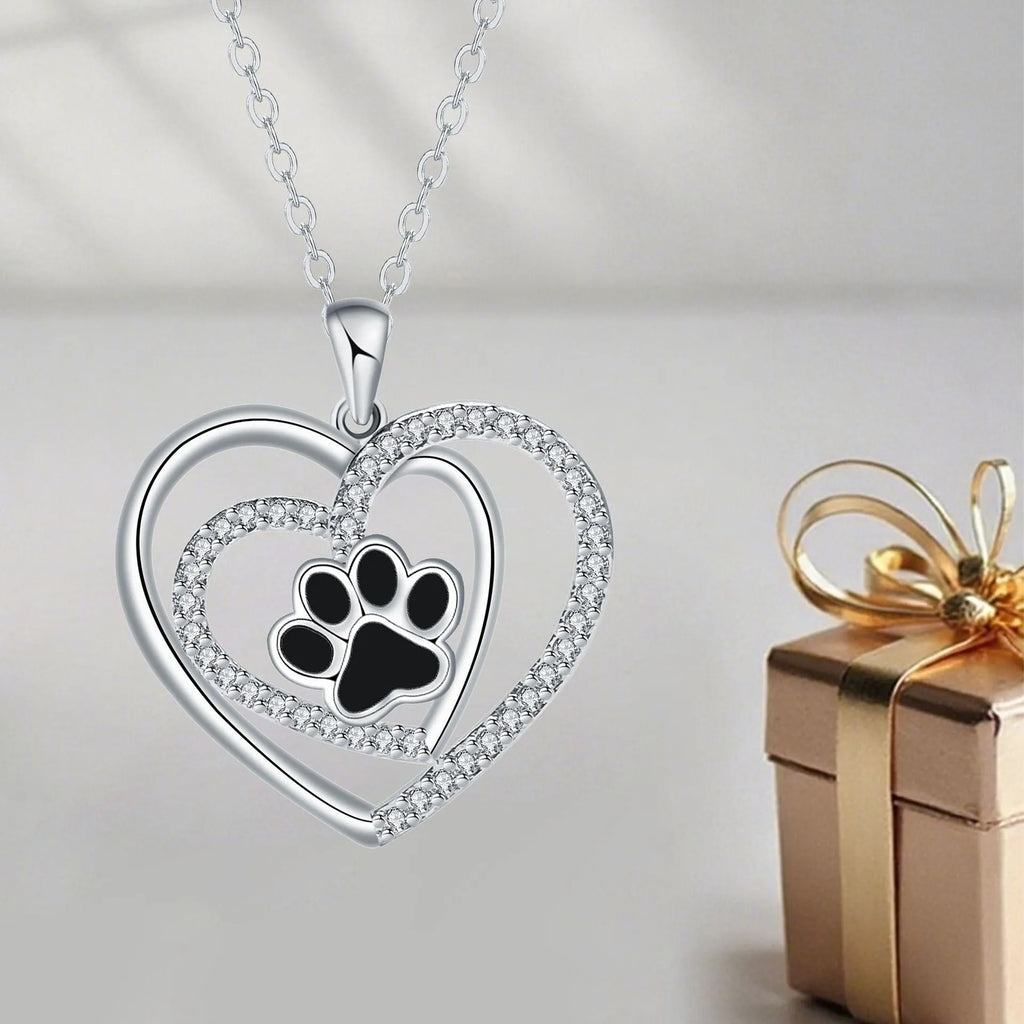 Women's necklace with dog paw print pendant on copper cross chain, heart-themed electroplated finish
